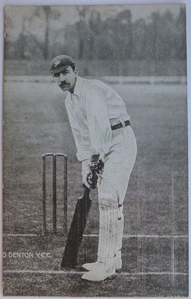 An original full-length postcard photograph of David Denton at the wicket, batting.