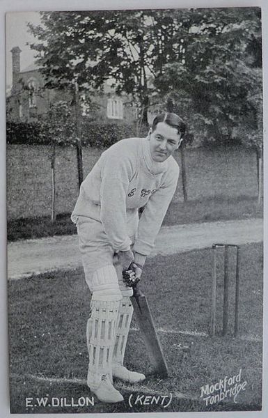 An original full-length postcard photograph of E.W. Dillon batting.