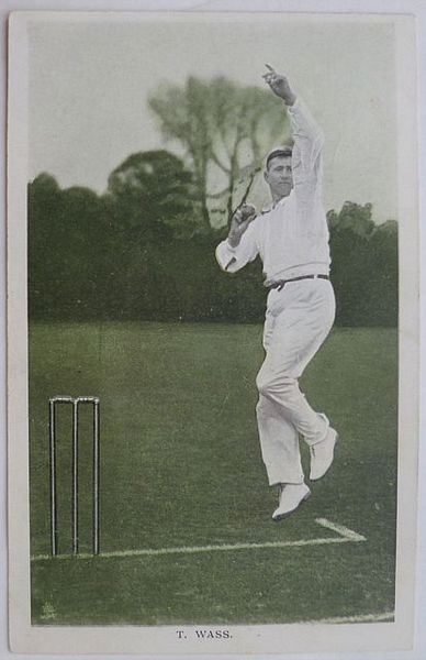 An original full-length colour postcard photograph of T. Wass bowling.