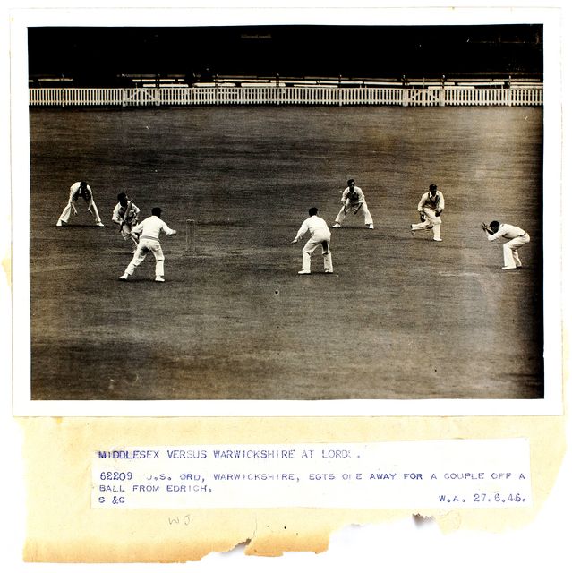 An original press photograph of J.S. Ord batting against the bowling of W.J. Edrich during the match between Middlesex and Warwickshire at Lord's, June 1946.