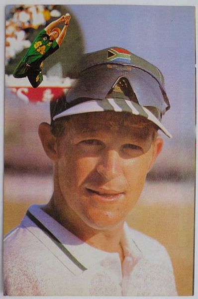 An original head and shoulders colour postcard photograph of Jonty Rhodes.
