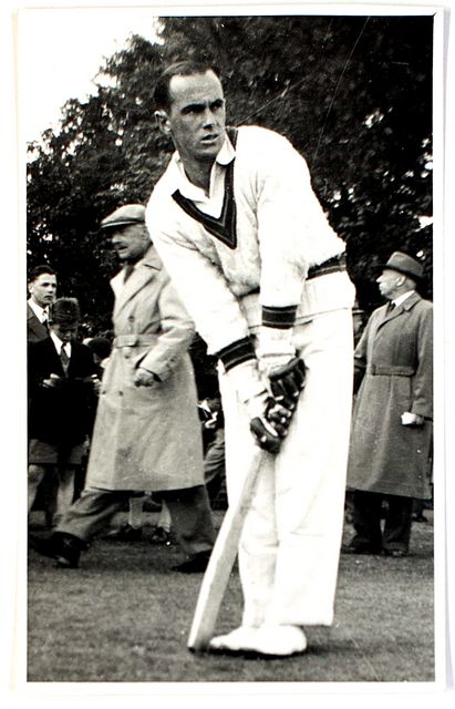 An original full length postcard-size photograph of Ian Craig batting.