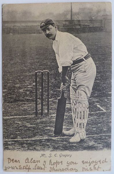 An original full length postcard photograph of Sydney Gregory at the wicket, batting.