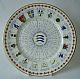 A Royal Grafton china plate decorated with a central design of the county badge and the scores of the season's county matches. The outer rim incorporates a design of seventeen county badges with balls and bails.