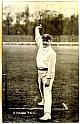 An original full-length postcard photograph of Schofield Haigh at the wicket, bowling.