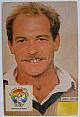An original head and shoulders colour postcard photograph of Jeff Crowe.