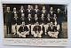 An original postcard photograph of the Australian team which toured England in 1938.