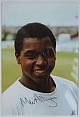 An original head-and-shoulders colour photograph of Mark Alleyne.