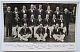 An original postcard photograph of the Australian team which toured England in 1938.