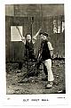 An original humorous postcard photograph of two urchins playing cricket.  