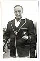 An original three-quarter length postcard-size photograph of Ian Johnson.