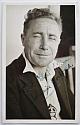 An original head-and-shoulders postcard-size photograph of John Arnold.